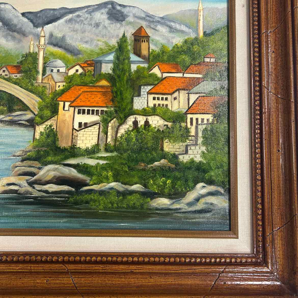 Painting of Town on River w/Mountains