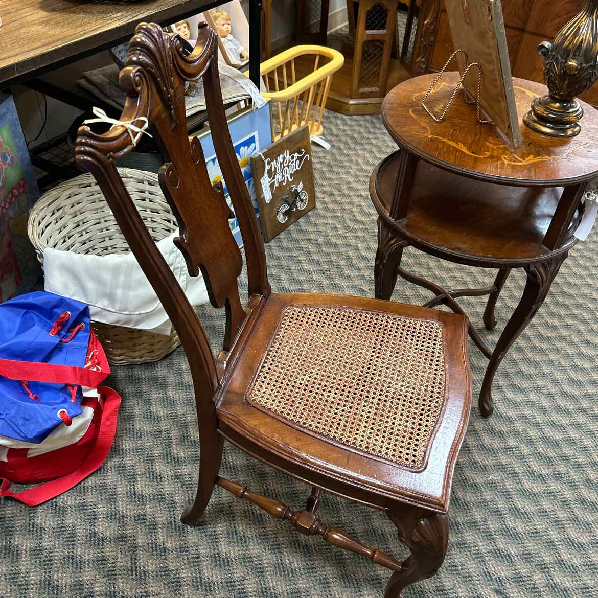 Wood Carved Chair w/Cane Seat