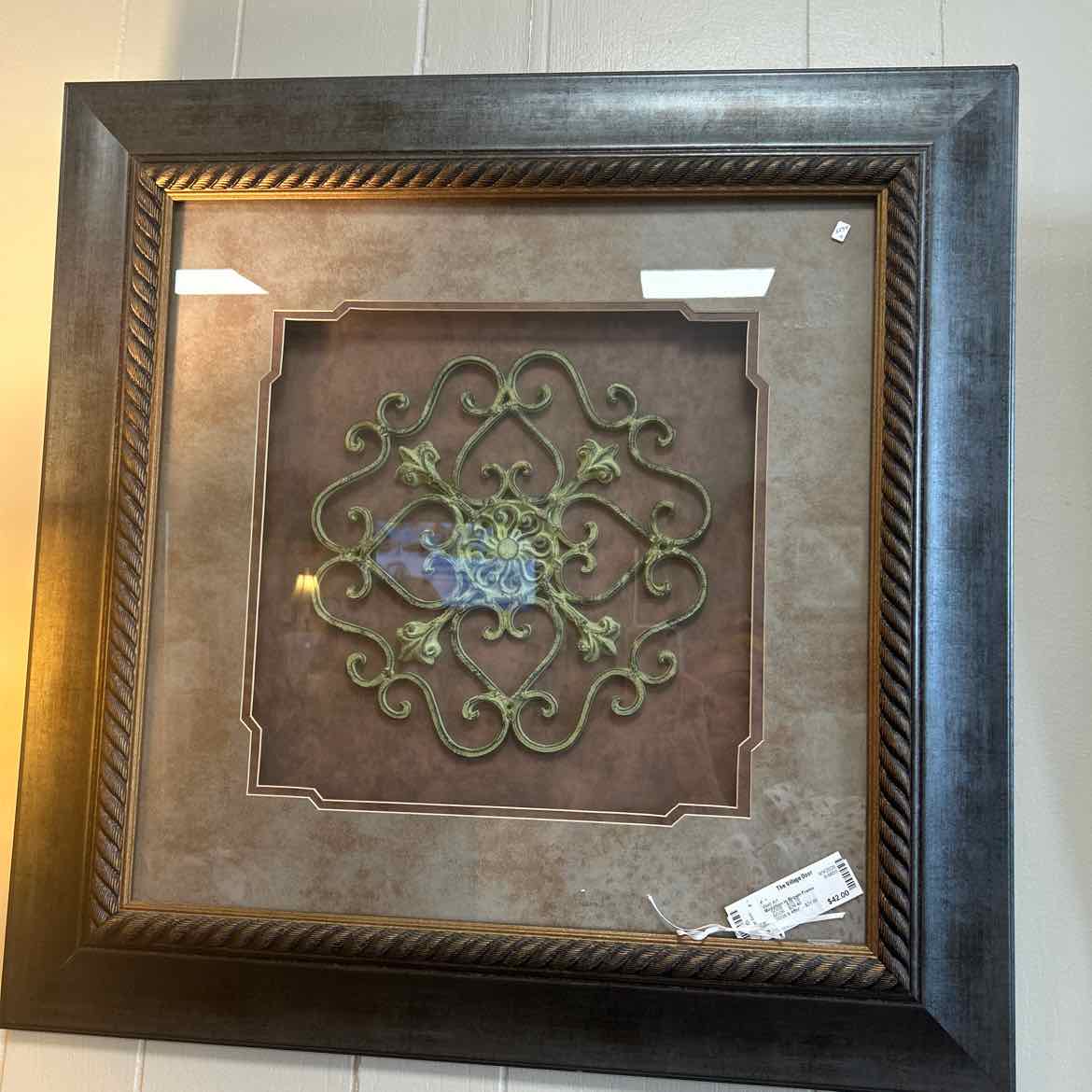 Medallion in Brown Frame