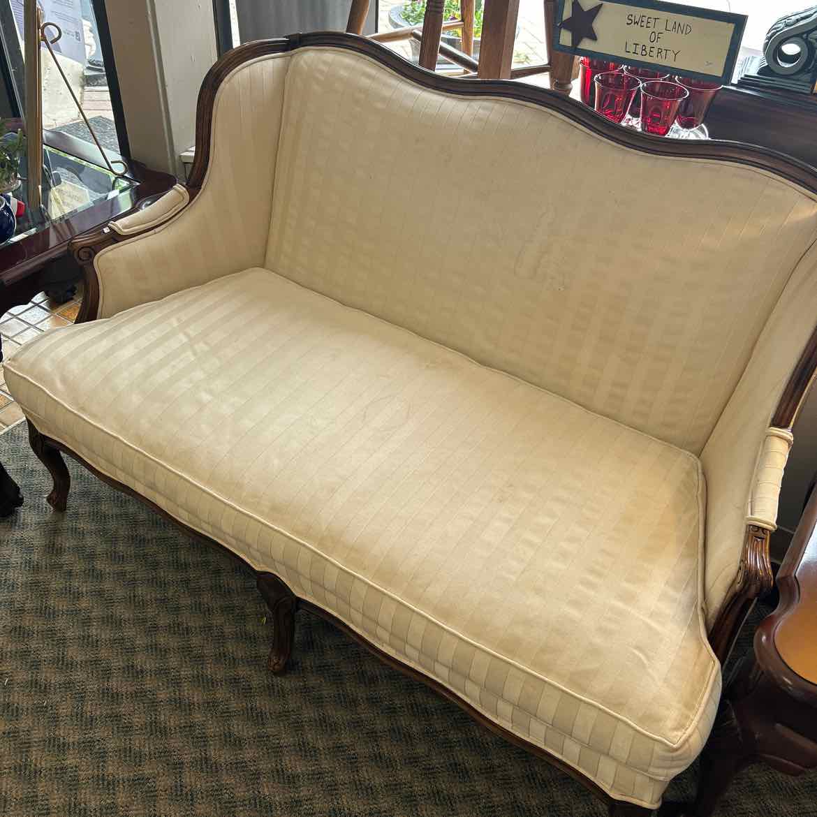 White Loveseat w/Wood Trim