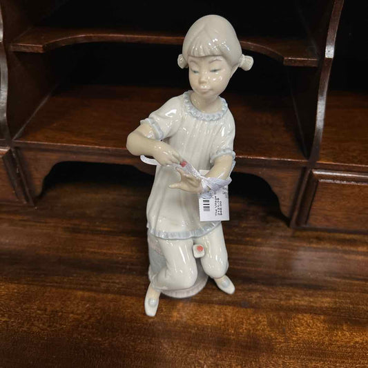 Lladro -Girl Manicuring