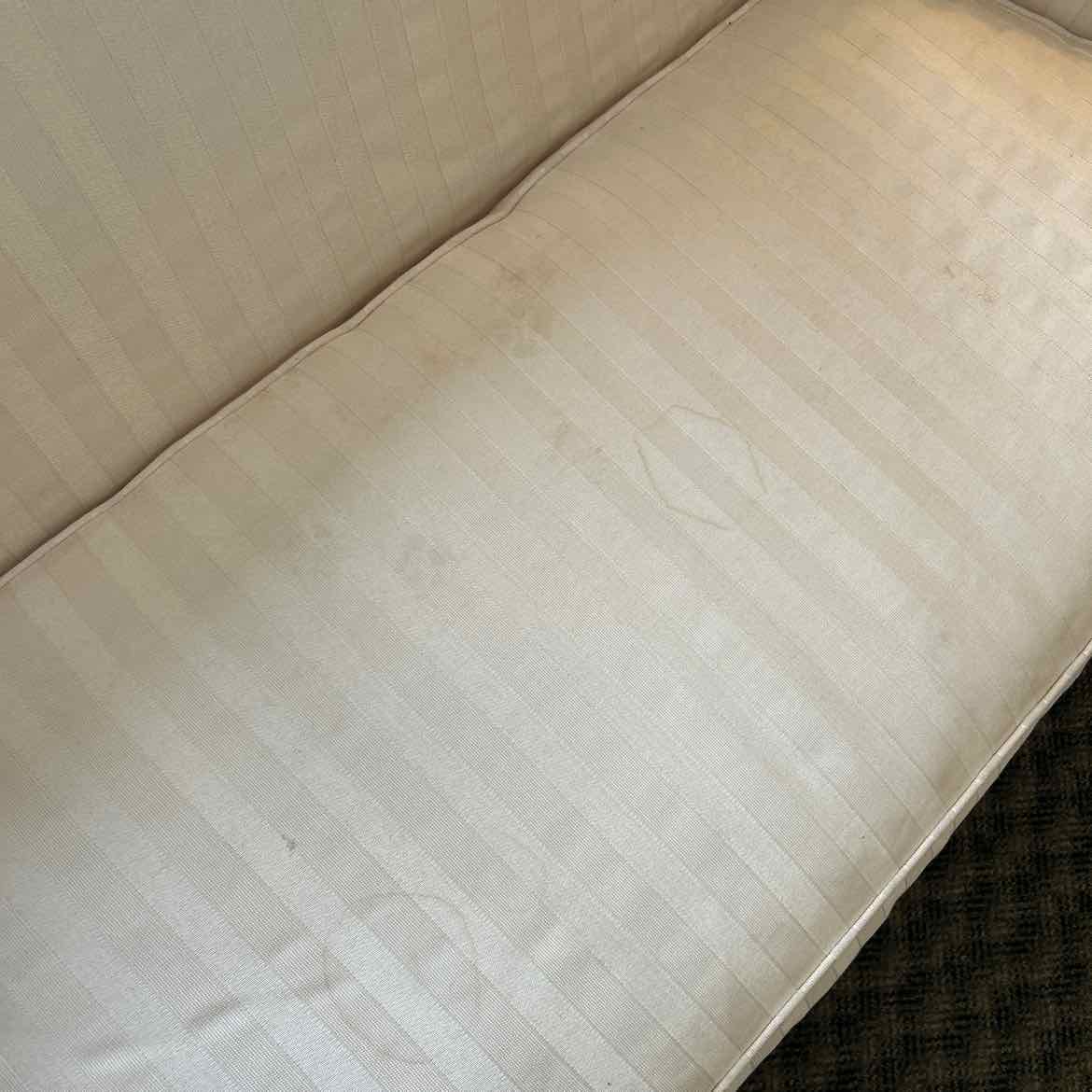 White Loveseat w/Wood Trim